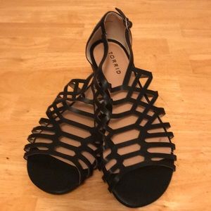 Women’s black gladiator sandals, size 9W